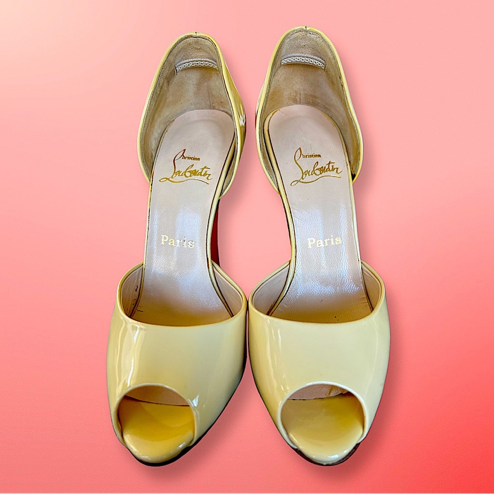 Christian Louboutin Leather D'Orsay Pumps
Peep-Toes
Stiletto Heels with Platform